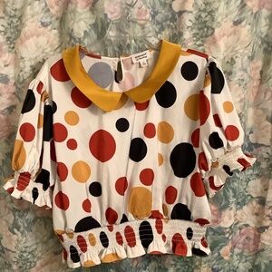 Polka dot peplum blouse